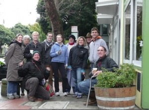 people sitting at the corner of Duboce and Sanchez