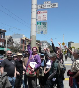 group with Reservoir Street sign